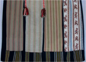 Särna/Idre kjol med fyra olika förkläden och band.